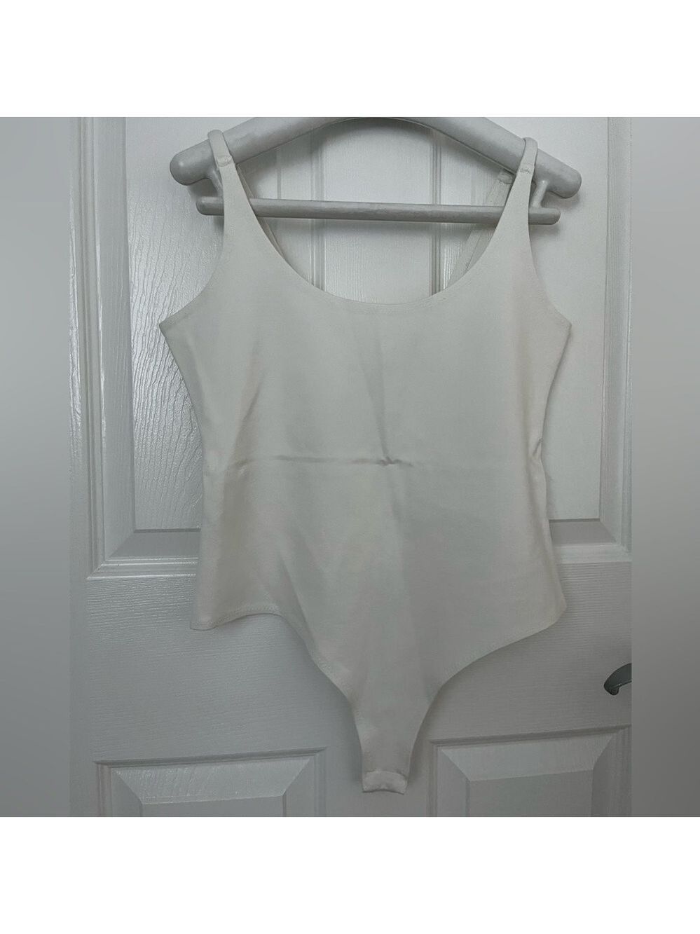 Stella Luce White Bodysuit, Size Medium.